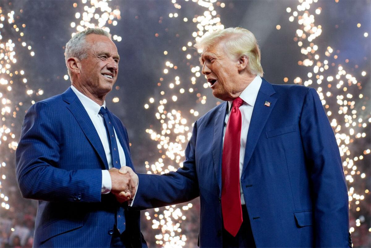 Former President Donald Trump shakes hands with Robert F. Kennedy Jr. at a presidential campaign rally at the Desert Diamond Arena in Glendale, Ariz., on Aug. 23, 2024. (Evan Vucci/AP Photo)