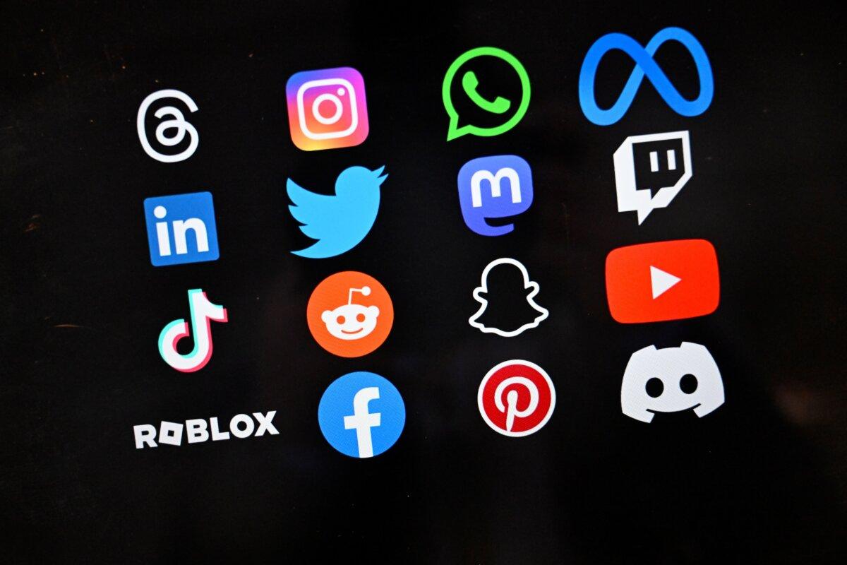 A photo of logos of major social media platforms and companies. (AAP Image/Lukas Coch)