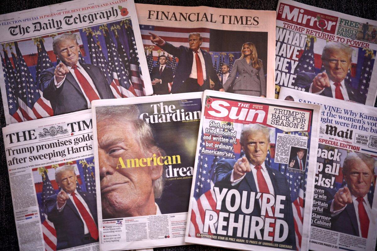 A Nov. 7 photo taken in London shows the front pages of British newspapers after the reelection of Donald Trump. (Henry Nicholls/AFP)