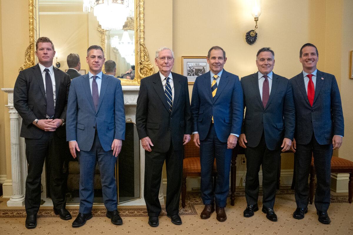 Senate Minority Leader Mitch McConnell (R-Ky.) (3rd L) greets newly-elected Republican Senators (L–R) Tim Sheehy (R-Mont.), Jim Banks (R-Ind.), John Curtis (R-Utah), Dave McCormick (R-Pa.), and Bernie Moreno (R-Ohio) on Capitol Hill in Washington on Nov. 12, 2024. (Andrew harnik/Getty Images)