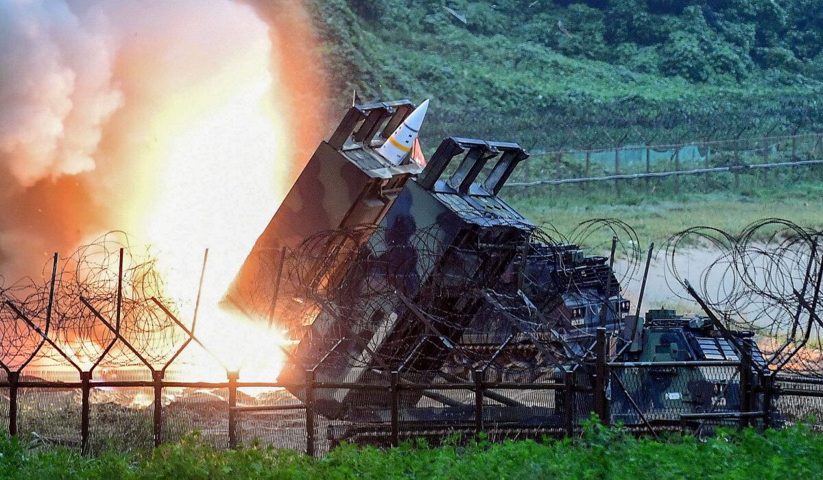 A U.S. Army Tactical Missile System fires a missile into the East Sea during a South Korea–U.S. joint missile drill in South Korea, on July 29, 2017. (South Korean Defense Ministry via Getty Images)