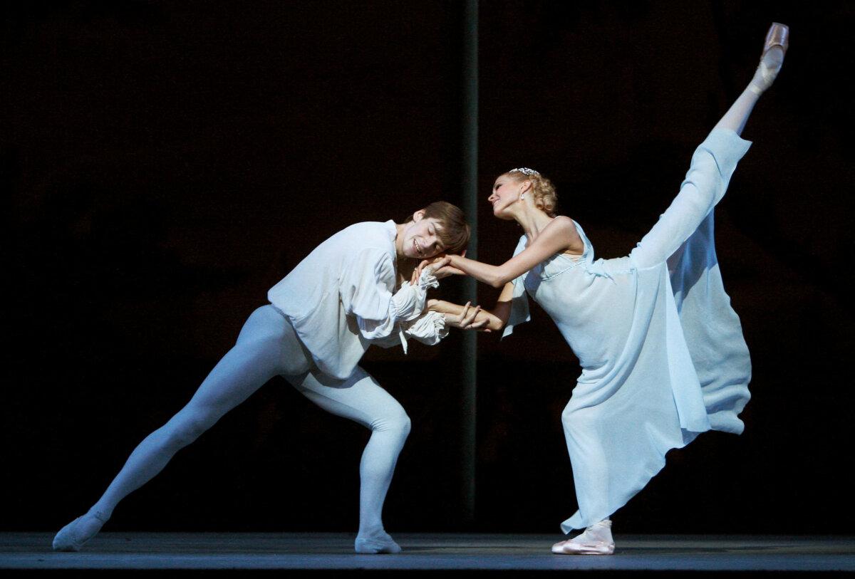 Dancers Vladimir Shklyarov and Alina Somova perform during a rehearsal for the Mariinsky (formerly the Kirov) Ballet performance of "Romeo and Juliet" at the Royal Opera House in London on Aug. 3, 2009. (Reuters/Luke MacGregor)