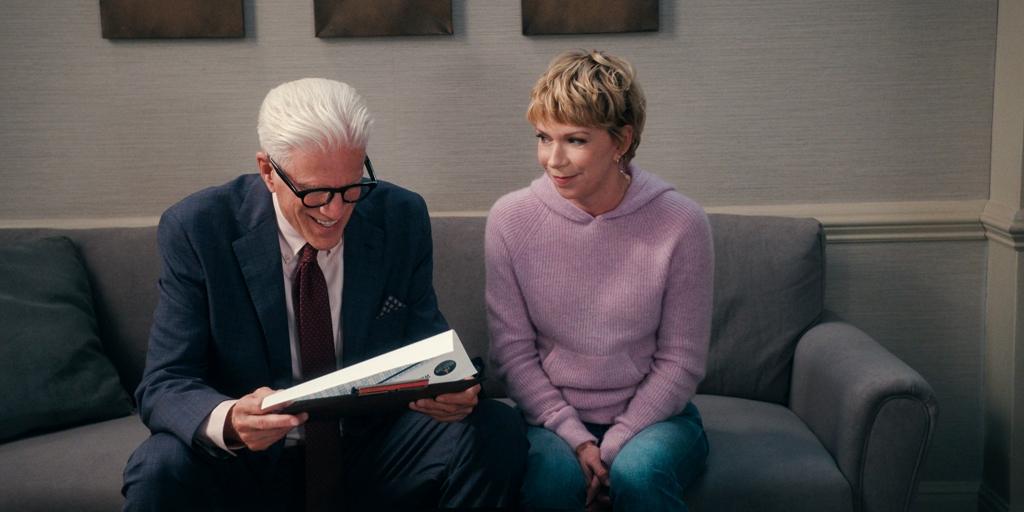 Charles (Ted Danson) looks at an ad that his daughter Emily (Mary Elizabeth Ellis) gave him, in "A Man on the Inside." (Netflix)