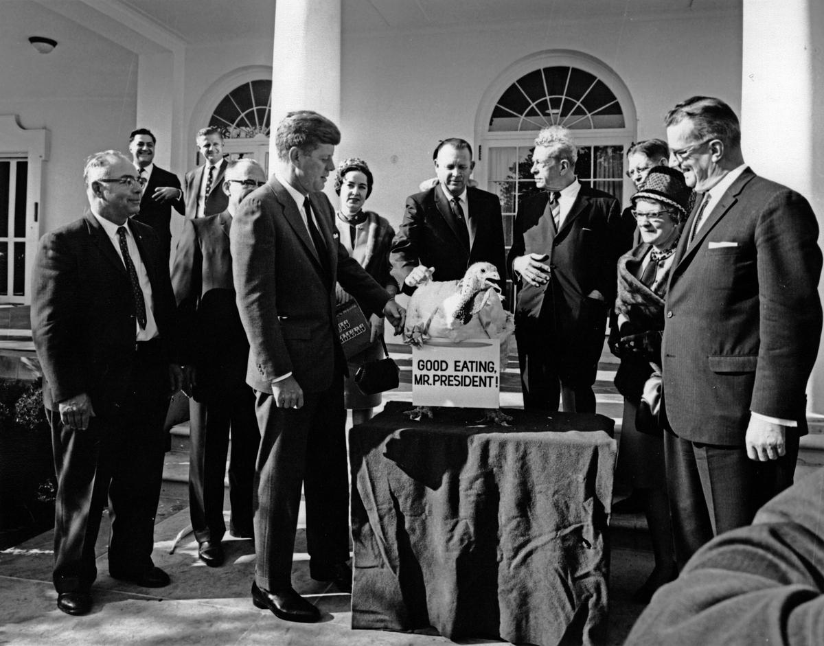 President John F. Kennedy receives the 16th White House Thanksgiving Turkey on Nov. 19, 1963. National Archives. (Public Domain)