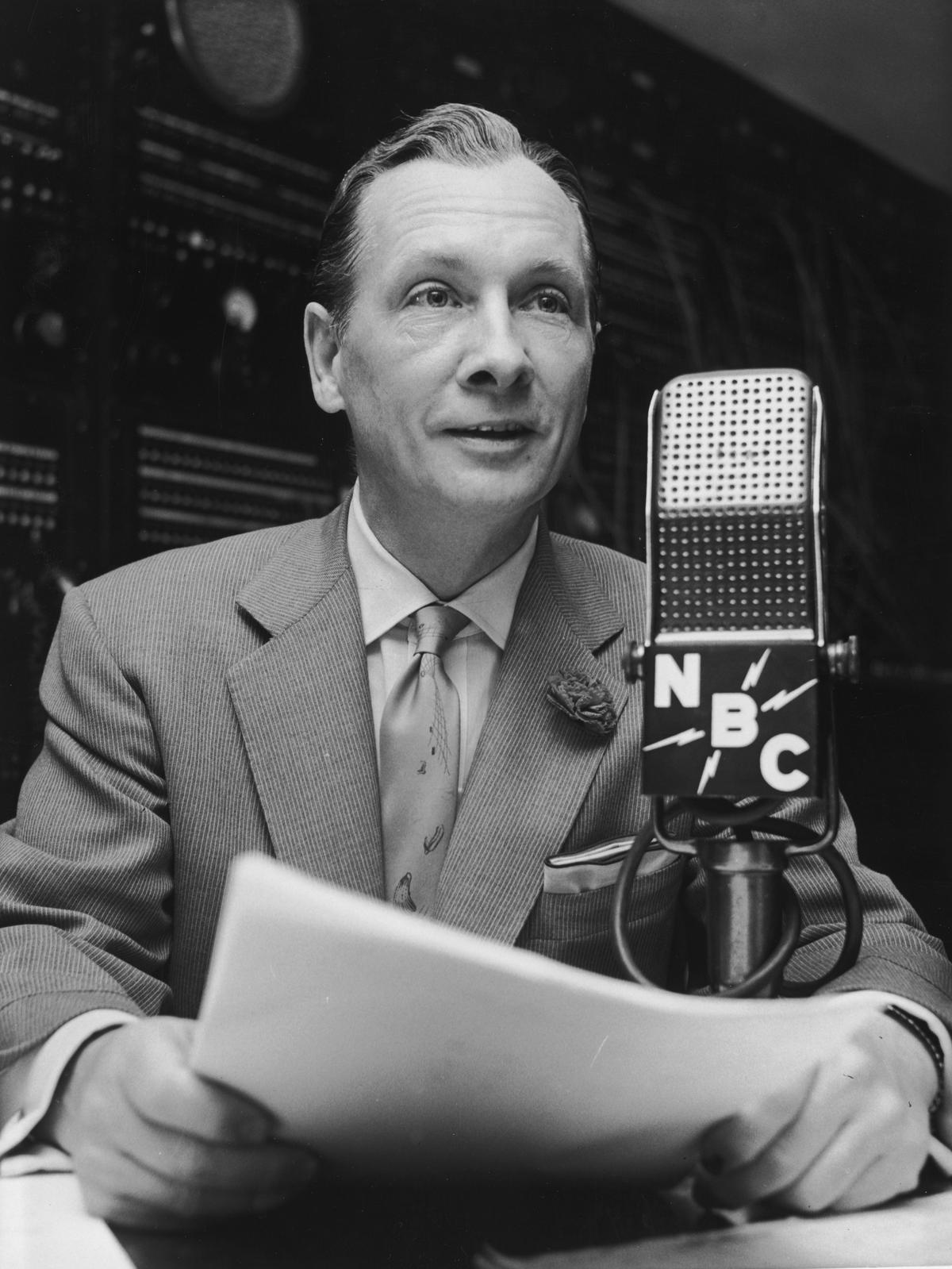 John Cameron Swayze took time out from “hop-scotching the world for headlines” on his nightly TV news “Caravan” to broadcast a section on NBC’s “Monitor” in 1955. (Hulton Archive/Getty Images)