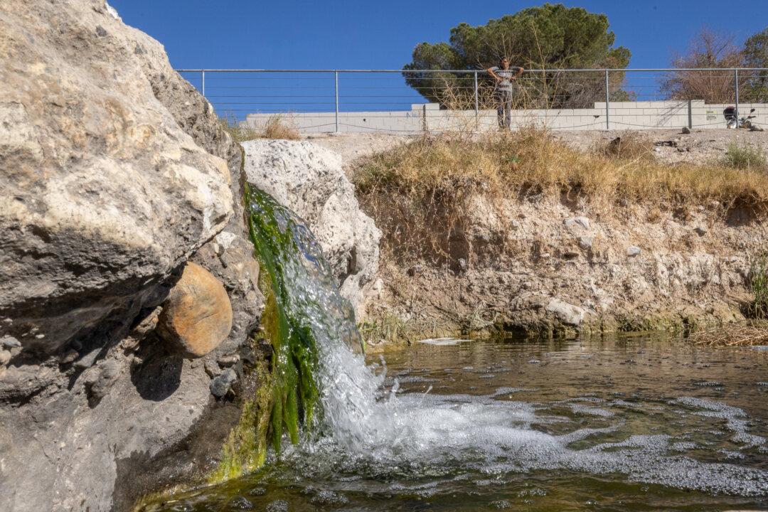 Sewage water used by a nearby homeless encampment for drinking and bathing flows in Las Vegas, NV., on Nov. 14, 2024. (John Fredricks/The Epoch Times)