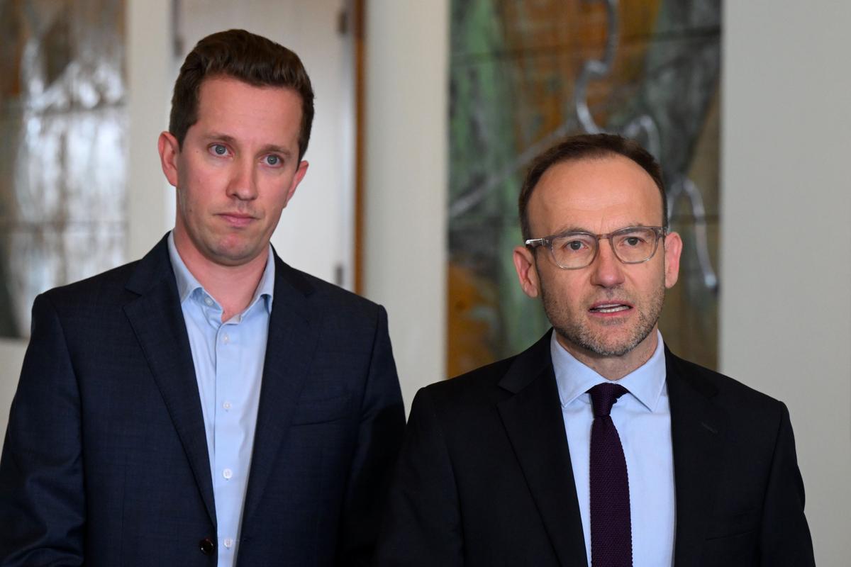 Australian Greens Leader Adam Bandt and Housing spokesperson Max Chandler-Mather speak to the media during a press conference at Parliament House in Canberra, Australia on Nov. 25, 2024. (AAP Image/Lukas Coch)