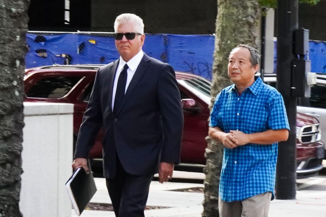 Ex-Verizon Engineer Gets 4 Years in Prison for Spying on Falun Gong, Other Chinese Dissidents