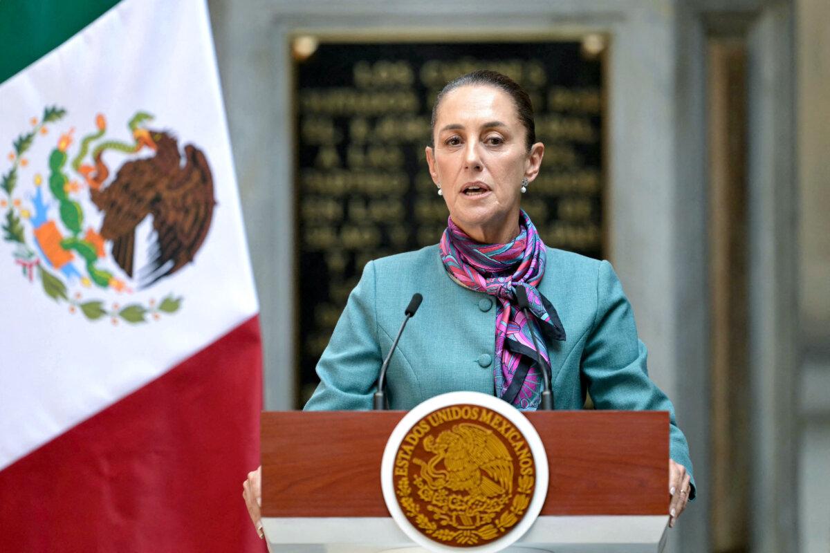 Mexican President Claudia Sheinbaum speaks during the summit between Mexican and U.S. leaders and businessmen at the National Palace in Mexico City on Oct. 15. (Yuri Cortez/AFP via Getty Images)