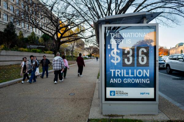 The national debt clock at a bus station in Washington on Nov. 26, 2024. (Madalina Vasiliu/The Epoch Times)
