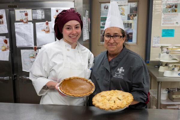 Bella Black, left, stands with her instructor, Becky Brookshire, inside the Bidwell Pastry Culinary School’s kitchen on Thursday, Nov. 14, 2024, in Braddock, Pennsylvania. (Benjamin B. Braun/Pittsburgh Post-Gazette/TNS