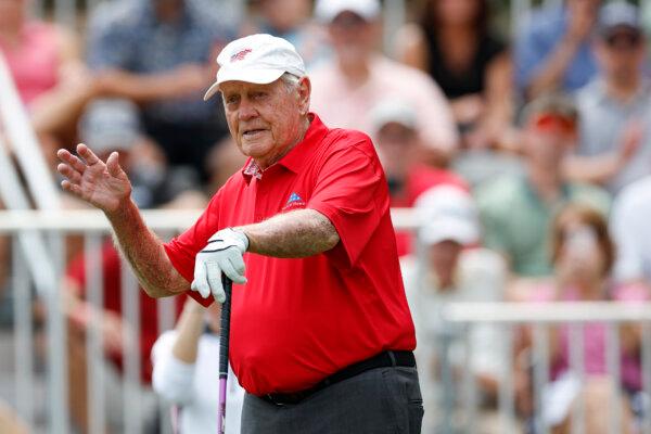 Jack Nicklaus of the United States acknowledges the crowd on the 10th hole as he participates in the Folds of Honor Greats of Golf held in conjunction with the first round of the Insperity Invitational at The Woodlands Golf Club in The Woodlands, Texas, on May 4, 2024. (Aaron Sprecher/Getty Images)