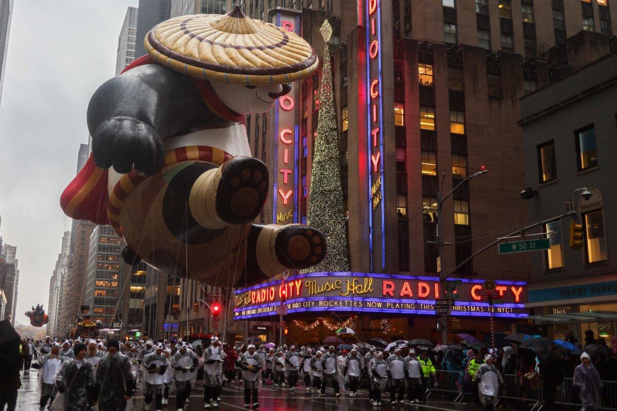 The Kung Fu Panda balloon floats past Radio City Music Hall during the annual Macy's Thanksgiving Day Parade in New York on Nov. 28, 2024. (Charly Triballeau/AFP via Getty Images)