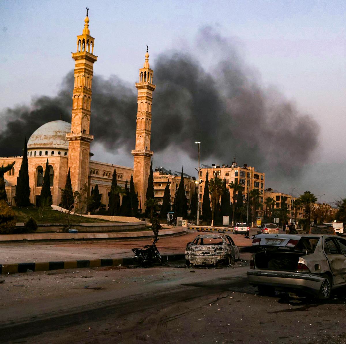 Day in Photos: Relentless Rain, Attack in Syria, and a Vintage Car Show