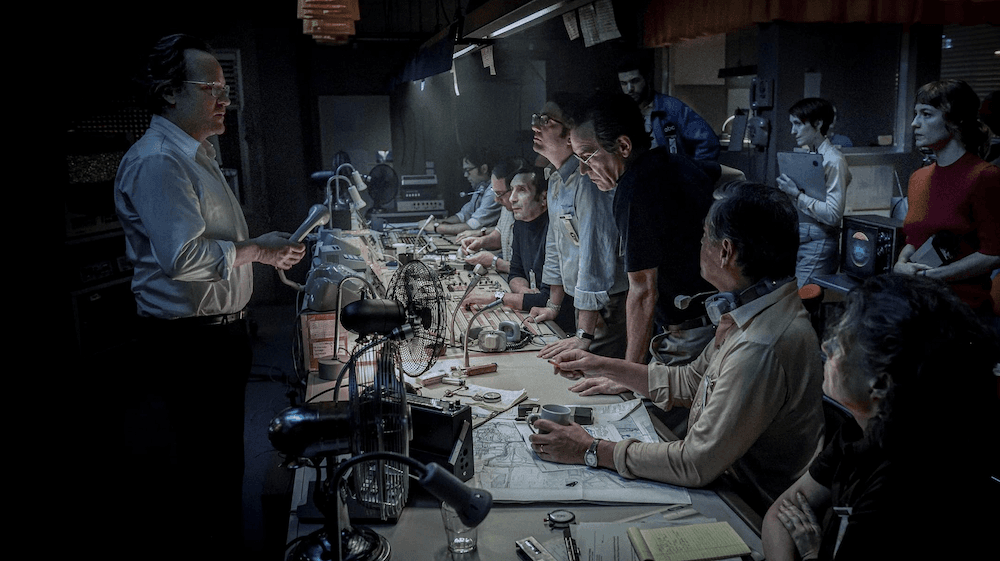 Roone Arledge (Peter Sarsgaard, L) instructs his sports coverage crew, in "September 5." (Paramount Pictures)