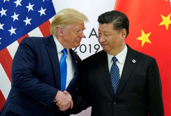 U.S. President Donald Trump meets with China's President Xi Jinping at the start of their bilateral meeting at the G20 leaders summit in Osaka, Japan, June 29, 2019. (Reuters/Kevin Lamarque/File Photo)