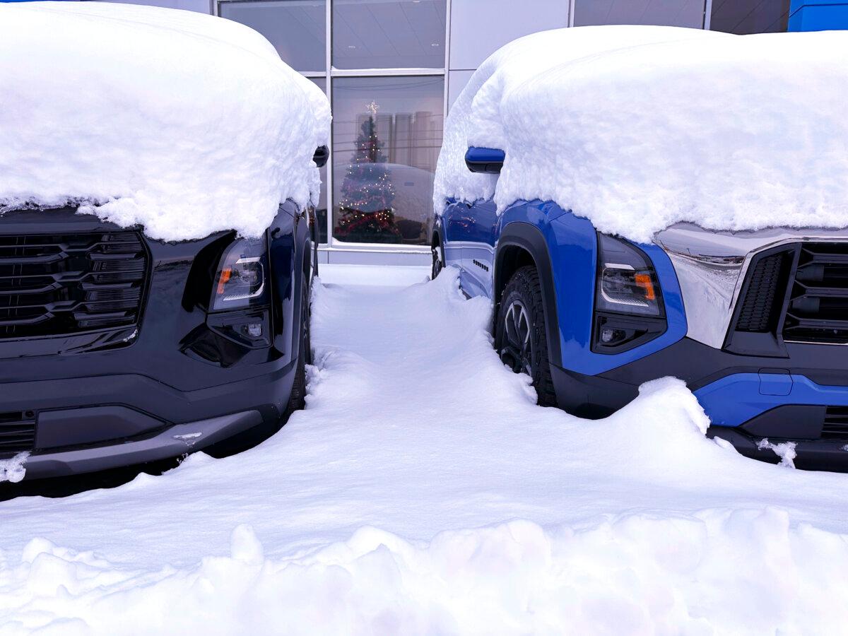 Vehicles are covered during a snow storm in Lowville, N.Y., on Dec, 1, 2024. (Cara Anna/AP Photo)