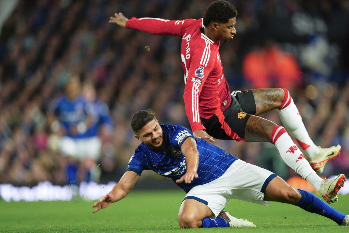 Ipswich Town's Sam Morsy, bottom, tackles Manchester United's Marcus Rashford during the English Premier League soccer match between Ipswich Town and Manchester United at Portman Road stadium in Ipswich, England, on Nov. 24, 2024. (Dave Shopland/AP Photo)