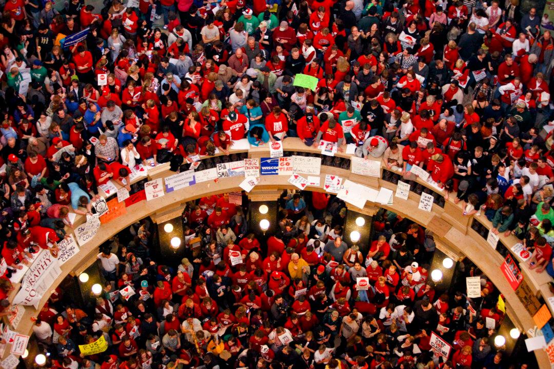 Judge Strikes Down Wisconsin Union Limits, Restores Collective Bargaining Rights