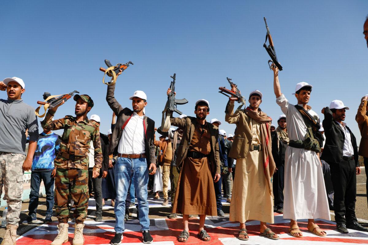 Newly recruited members of the Houthi terrorist group attend a protest march against the United States and Israel in Sanaa, Yemen, on Feb. 21, 2024. (Osamah Abdulrahman/AP Photo)