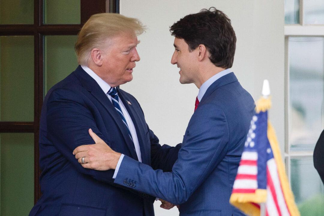 ‘Oh Canada!’: Trump Posts AI Image of Himself With Canadian Flag Atop Mountains