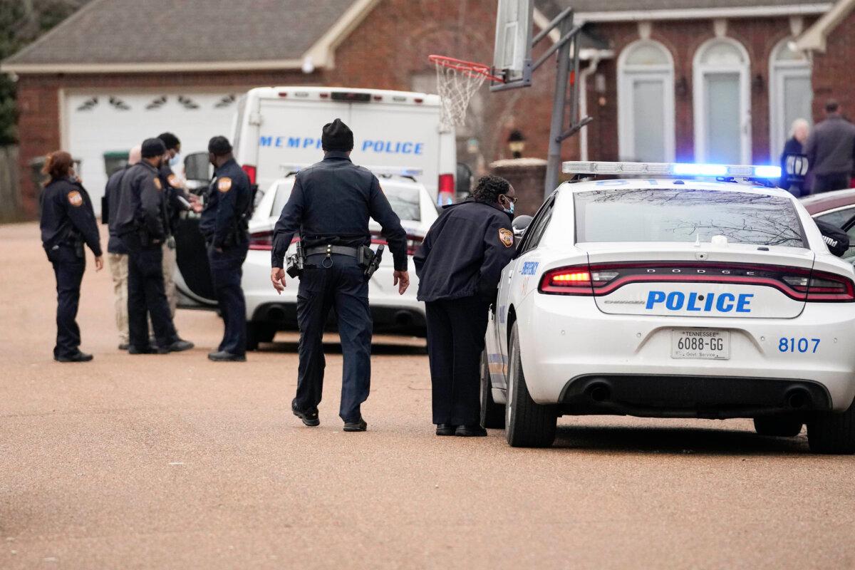 Memphis police officers work a crime scene on Jan. 24, 2023. (Gerald Herbert/AP Photo)