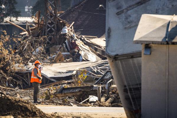 Clean-up efforts after Hurricane Helene are underway in Asheville, N.C., on Oct. 6, 2024. (John Fredricks/The Epoch Times)