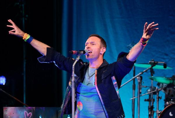 Chris Martin of Coldplay performs onstage at SiriusXM in New York City on Oct. 7. (Dimitrios Kambouris/Getty Images for SiriusXM)