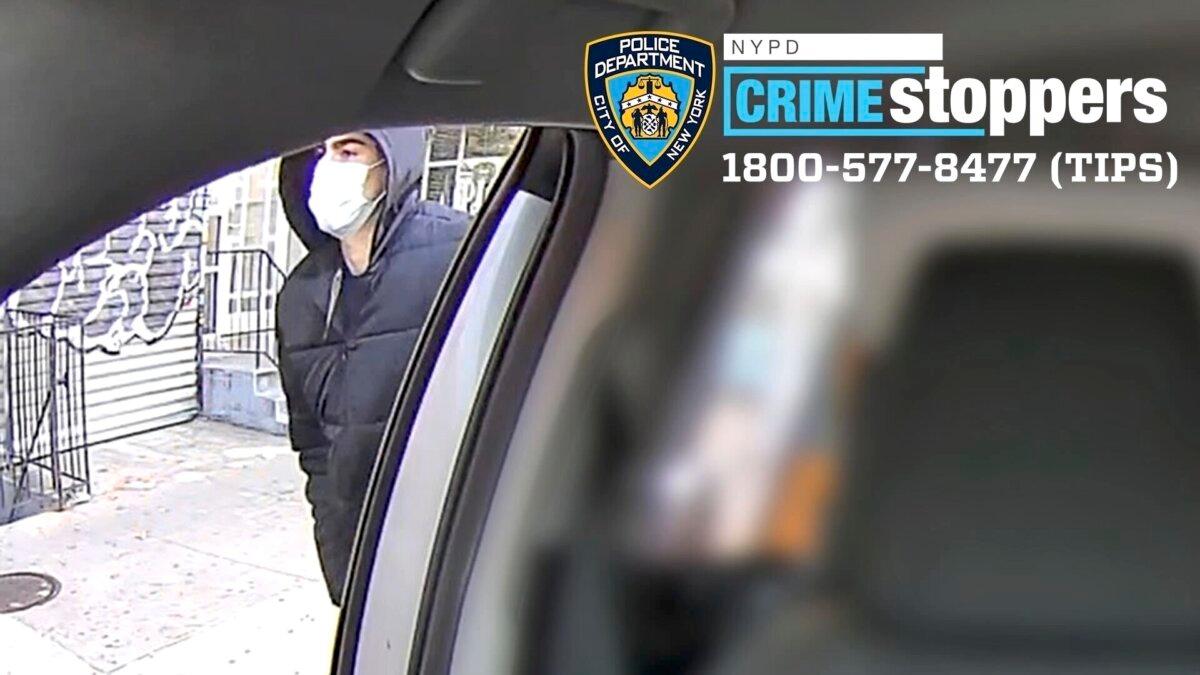 A suspect in the fatal shooting of UnitedHealthcare CEO Brian Thompson outside of a taxi in an undated photo. (NYPD via AP)