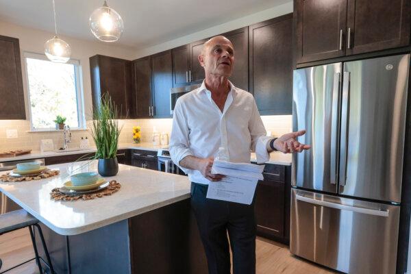Bob Hankin, president and CEO at Hankin Group, talks about eco-friendly features in the apartments at Passive House in Exton. (Steven M. Falk/The Philadelphia Inquirer/TNS)