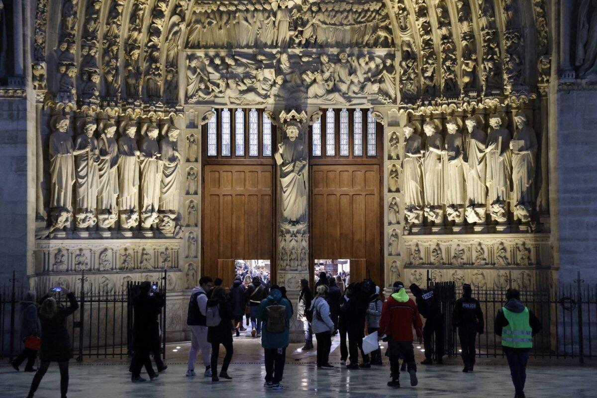 People arrive to attend a second Mass, open to the public, at Notre-Dame de Paris Cathedral on the day of its reopening in Paris on Dec. 8, 2024. (Ludovic Marin/AFP via Getty Images)