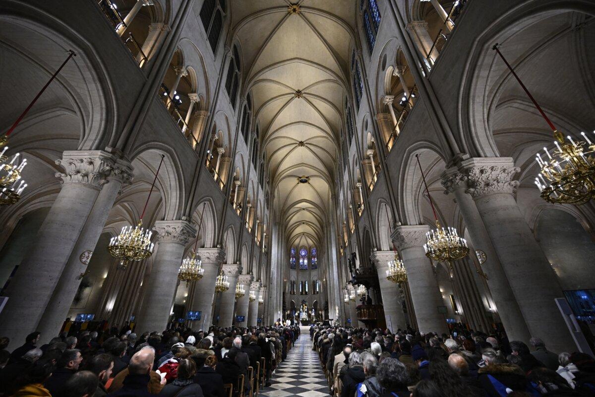 People attend a Mass, open to the public, at Notre-Dame de Paris Cathedral on the day of its reopening in Paris on Dec. 8, 2024. (Ludovic Marin/AFP via Getty Images)