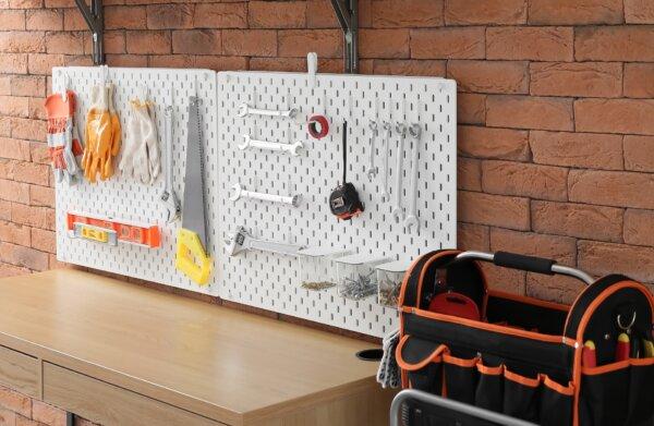 Tools and other items can be hung on a pegboard for tidy organization and easy access. (Pixel-Shot/Shutterstock)