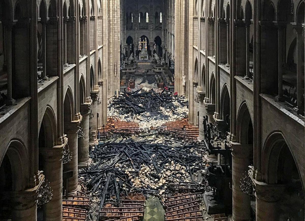 An interior view of the Notre-Dame Cathedral in Paris in the aftermath of a fire that devastated the cathedral, on April 16, 2019. (-/AFP via Getty Images)