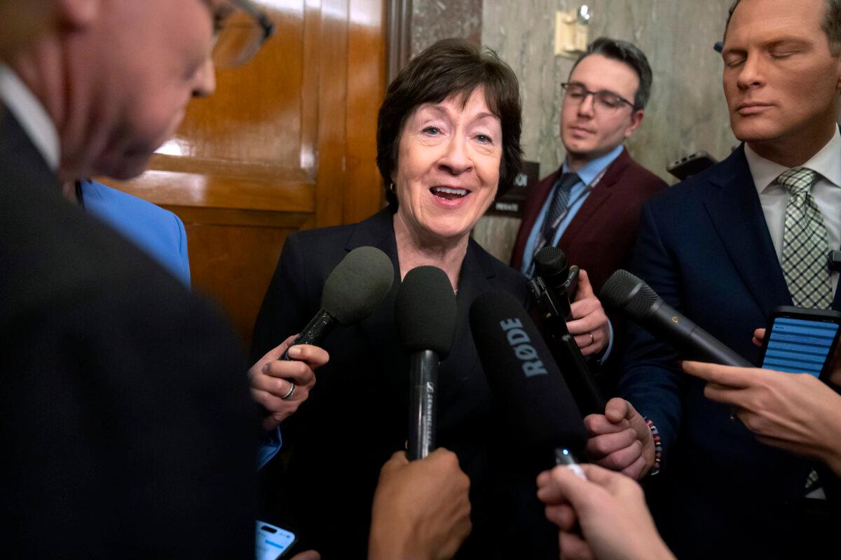 Sen. Susan Collins (R-Maine) speaks with reporters after meeting with Pete Hegseth, President-elect Donald Trump's choice to be defense secretary, on Capitol Hill in Washington on Dec. 11, 2024. (Mark Schiefelbein/AP Photo)