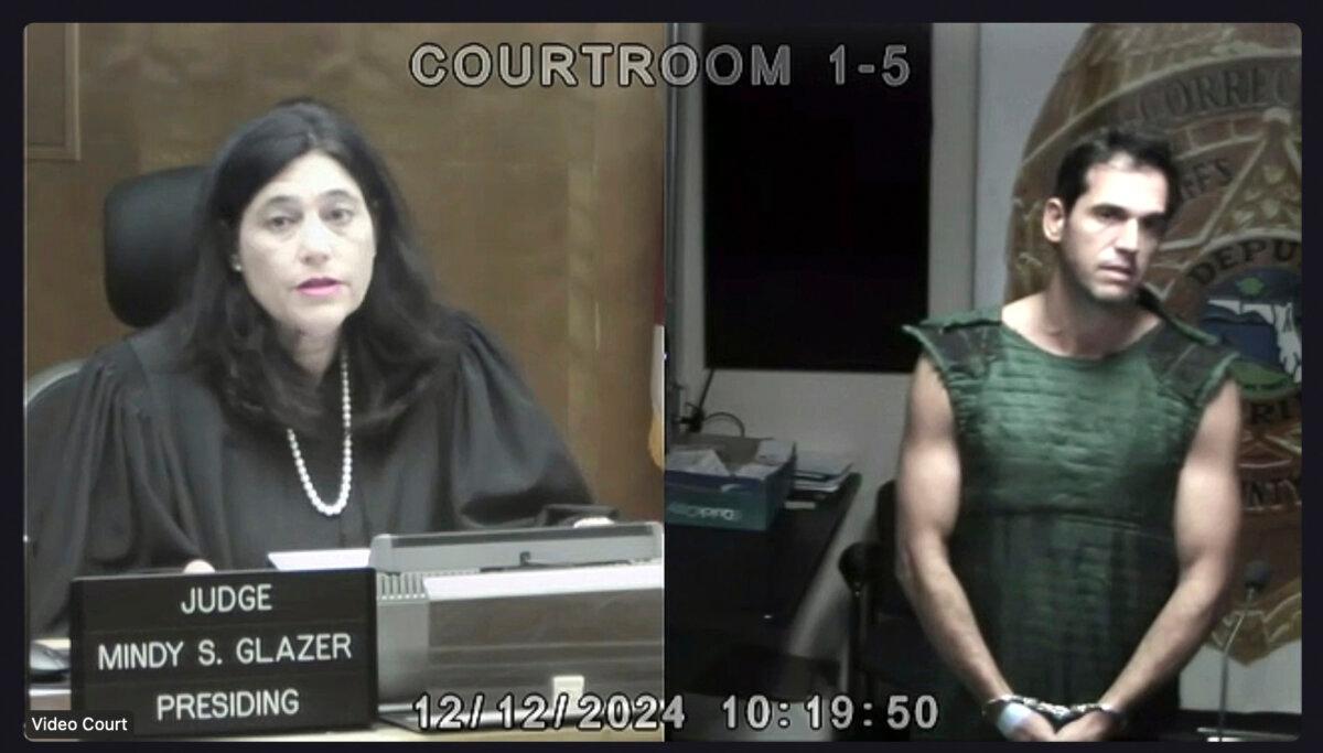 Miami Dade Circuit Court Judge Mindy S. Glazer via video presides over the first court appearance of Alon Alexander, who is charged with sexual battery along with his twin brother, Oren Alexander, in Miami on Dec. 12, 2024, in a still from video. (Miami Dade Circuit Court via AP, Pool)