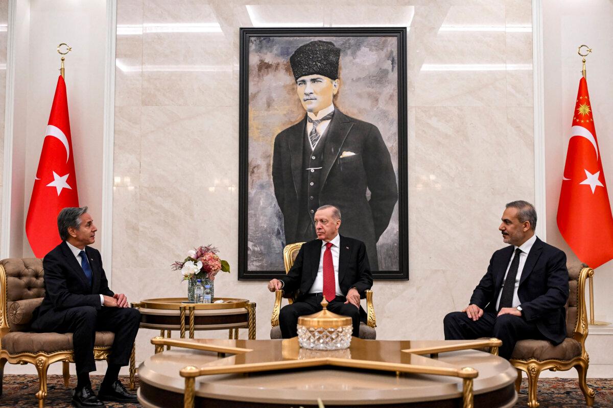 U.S. Secretary of State Antony Blinken (L) meets with Turkish President Recep Tayyip Erdogan (C) and Turkish Foreign Minister Hakan Fidan (R) at Ankara Esenboga Airport on Dec. 12, 2024. (Andrew Caballero-Reynolds/POOL/AFP via Getty Images)