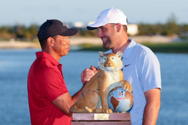 Tiger Woods of the United States congratulates Scottie Scheffler of the United States after the final round of the Hero World Challenge 2024 at Albany Golf Course in Nassau, Bahamas, on Dec. 8, 2024. (Kevin Cox/Getty Images)