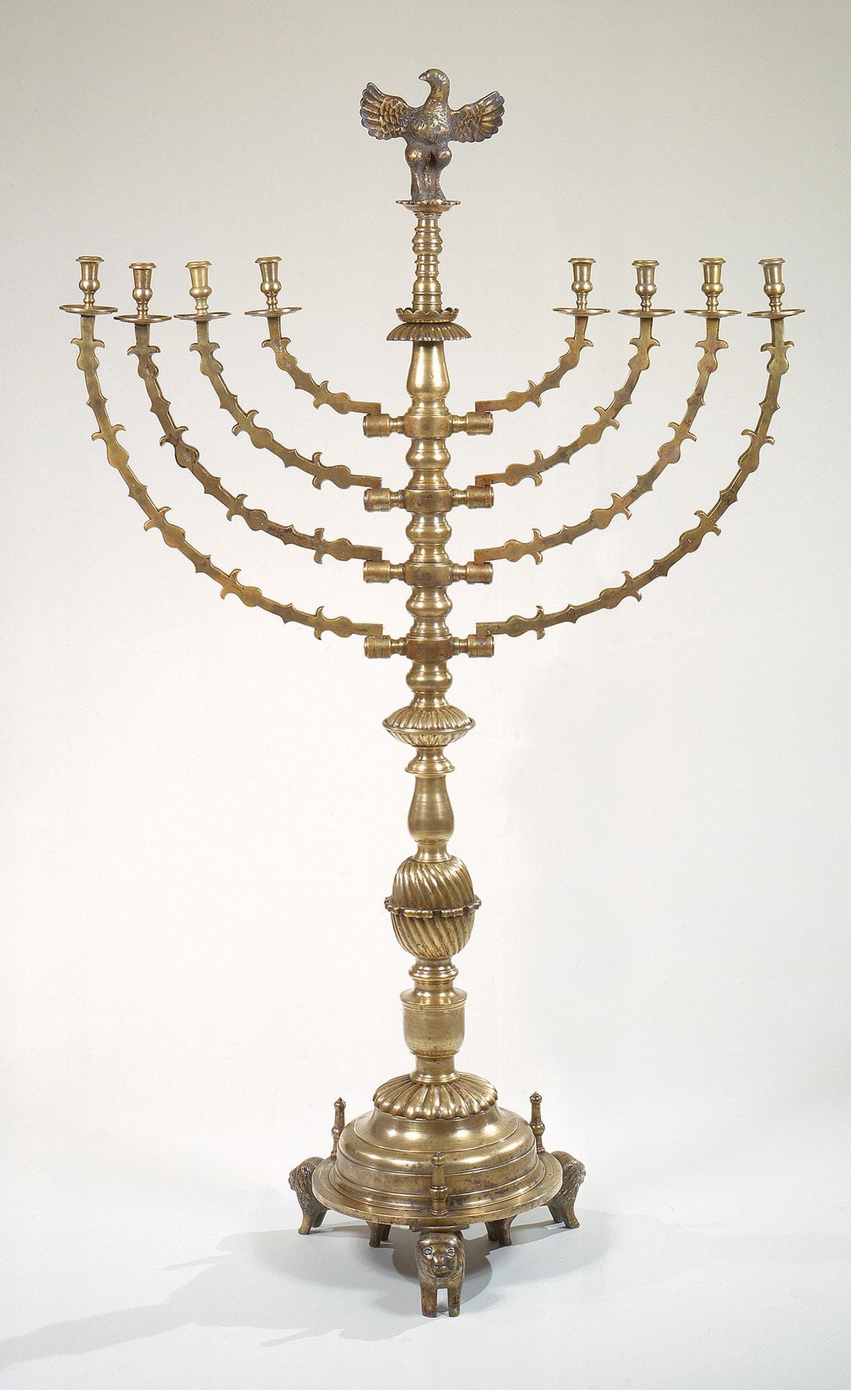 Hanukkah lamp, 18th century, from Eastern Galicia or western Ukraine. Copper alloy, cast and engraved; 70 1/2 inches by 44 1/4 inches by 18 inches. Jewish Museum, New York City. (Public Domain)