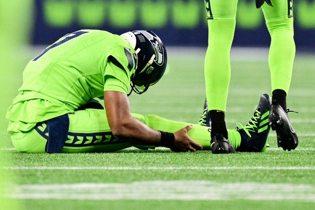 Seahawks Cautiously Optimistic About Quarterback’s Knee Injury