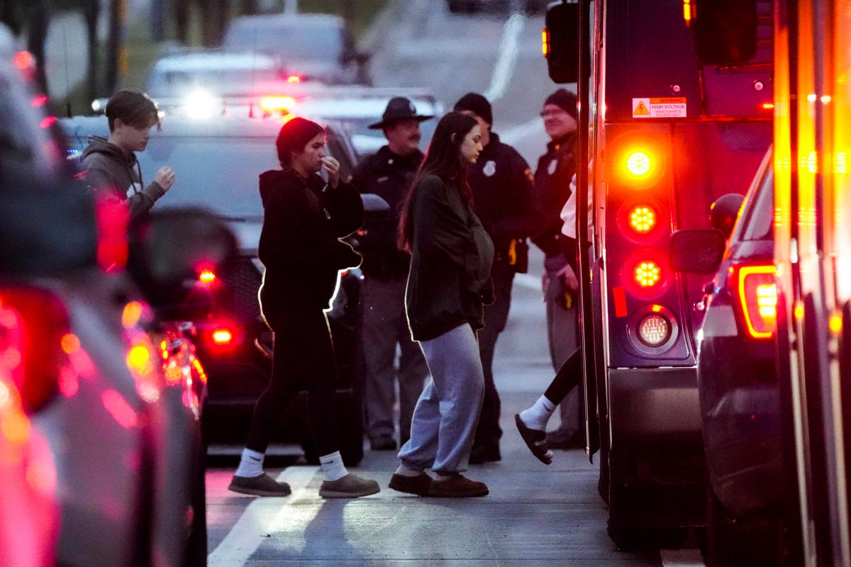 Day in Photos: Christian School Shooting, Scholz Loses Confidence Vote, and an Underwater Wedding thumbnail