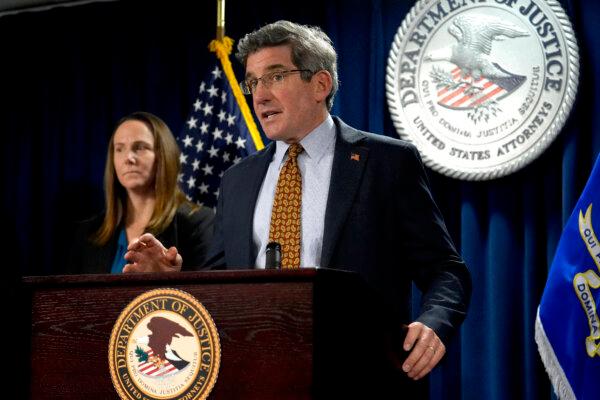 U.S. Attorney District of Massachusetts Joshua Levy (R) faces reporters as Special Agent in Charge FBI, Boston Division, Jodi Cohen, looks on during a news conference at the federal courthouse in Boston on Dec. 16, 2024. (Steven Senne/AP Photo)