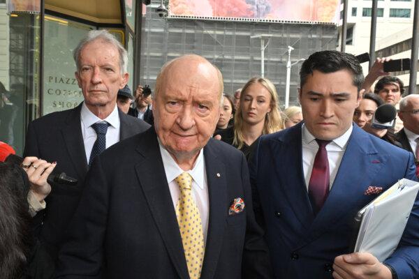Former veteran radio broadcaster and conservative commentator Alan Jones leaves the Downing Centre Local Court in Sydney, Australia on Dec. 18, 2024. (AAP Image/Mick Tsikas)