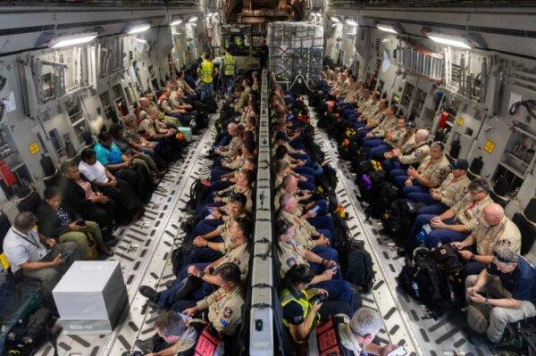 Relief workers fly in from Australia. (Courtesy of DFAT)
