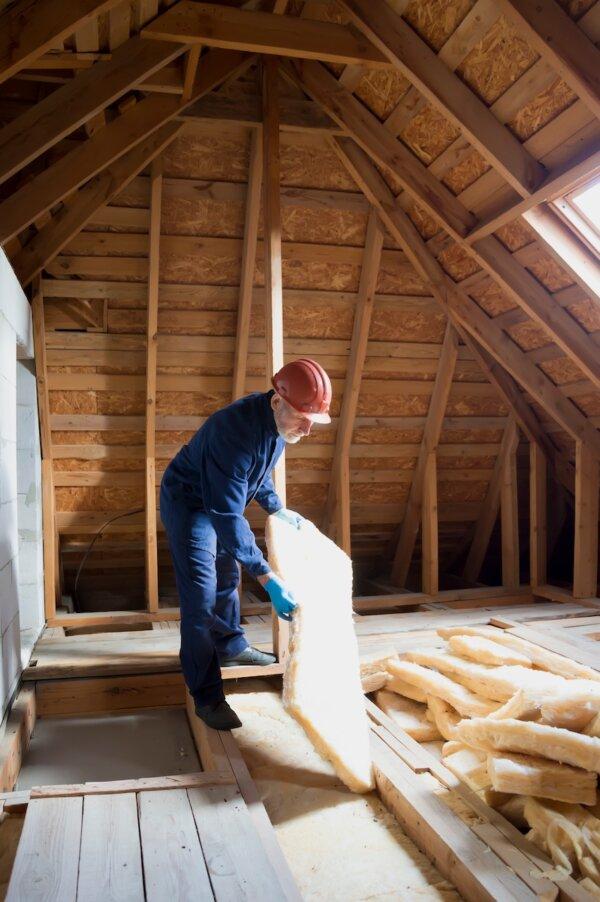 Roll or batts, which generally range from three to six inches thick, excel at quickly and easily filling the spaces between exposed studs, joists, and beams. (Natalia Nosova/Shutterstock)