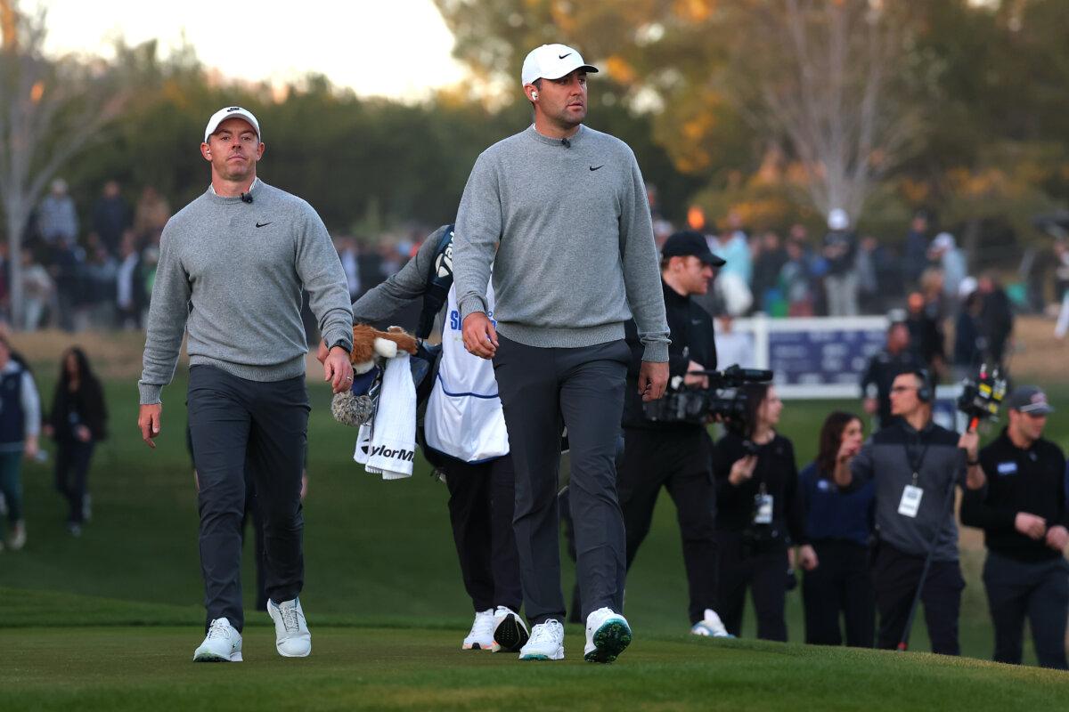 Rory McIlroy (L) and Scottie Scheffler of the PGA Tour walk the fourth hole during "Showdown at Shadow Creek" in Las Vegas, Nev., on Dec. 17, 2024. (Kevin C. Cox/Getty Images for The Showdown)