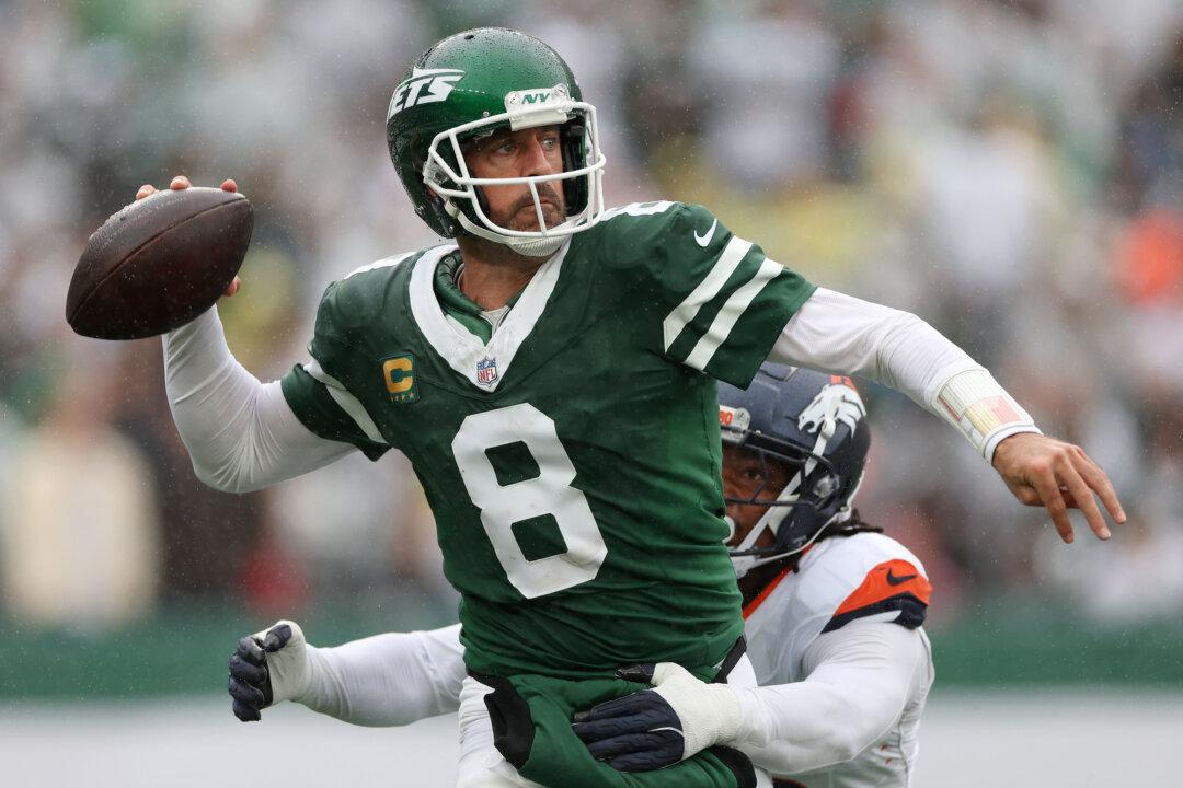 Aaron Rodgers Hints at Retiring When Discussing Kirk Cousins Getting Benched