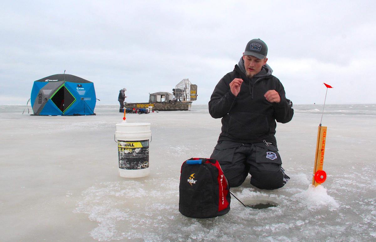 Common equipment includes an ice auger, fishing rods, bait, and a shelter or "ice shanty."(Courtesy of Bret Alexander)