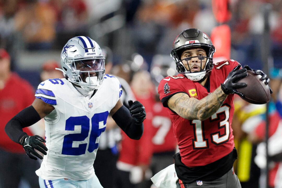 Cowboys Overcome a ‘Real Punch in the Gut’ to Stun Buccaneers