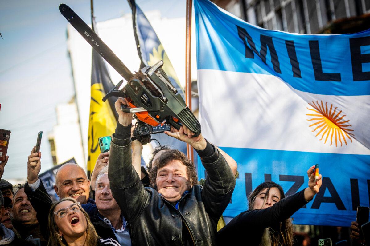 Then-presidential candidate Javier Milei of La Libertad Avanza lifts a chainsaw during a campaign rally in Buenos Aires, Argentina, on Sept. 25, 2023. (Tomas Cuesta/Getty Images)